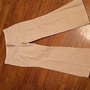 Biege linen slacks with button flap back pockets and adjustable waist straps, 2